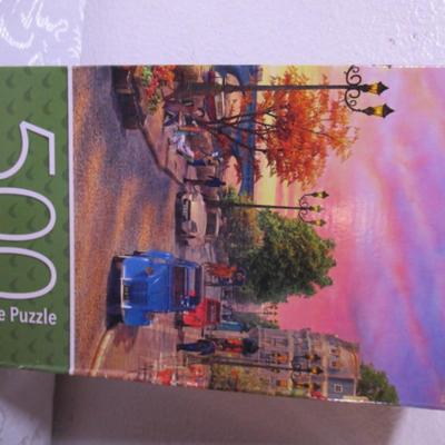 1 Picture Frame puzzle, 1 Siene Sunset puzzle, 1 Debbie Mumm puzzle