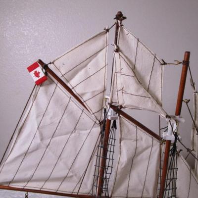 The Blue Nose racing yacht & fishing boat on display stand