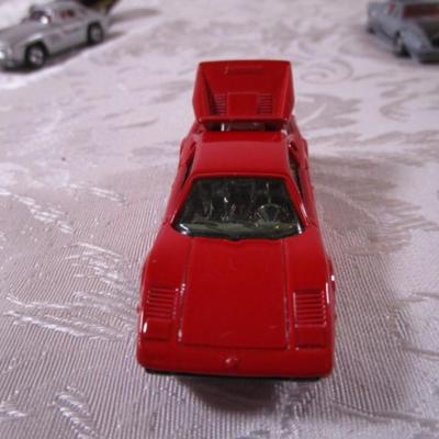 6 tomica die cast cars