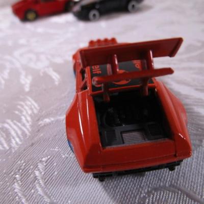 6 tomica die cast cars