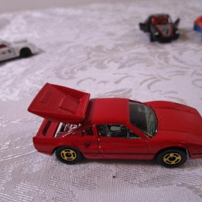 6 tomica die cast cars