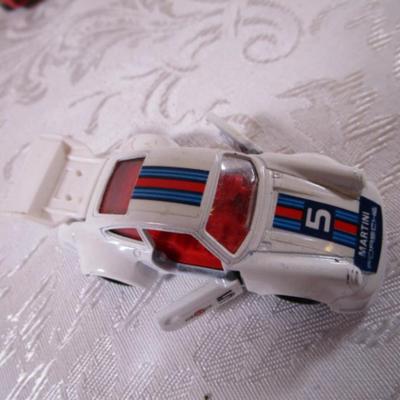 6 tomica die cast cars
