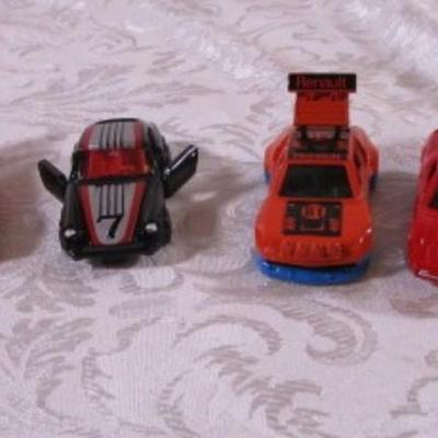 6 tomica die cast cars