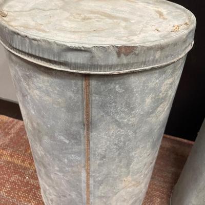 Round metal cans with lids