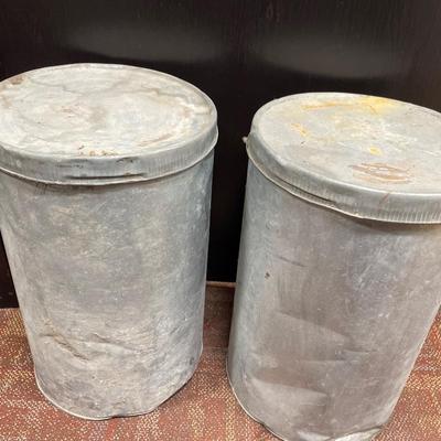 Round metal cans with lids