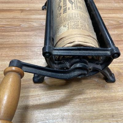 Vintage newspaper log roller