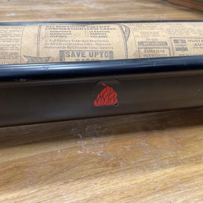 Vintage newspaper log roller
