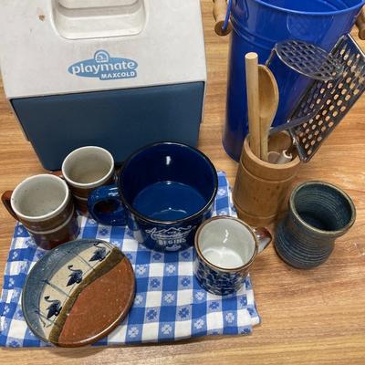 Blue pottery and picnic items