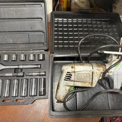 Socket set and Skil drill with saw attachment