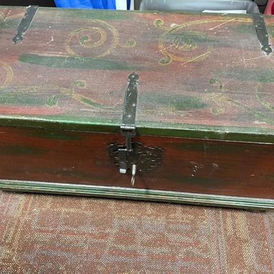 Wood chest with metal hinges and lock