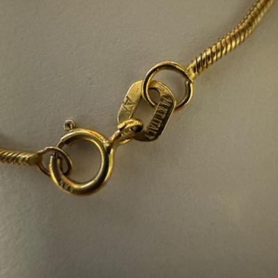 14kt Blue Sapphire Pendant with diamonds on 14kt chain