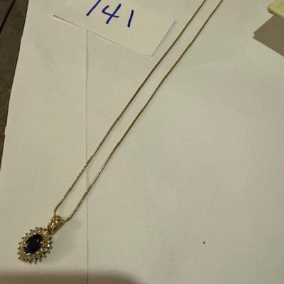 14kt Blue Sapphire Pendant with diamonds on 14kt chain