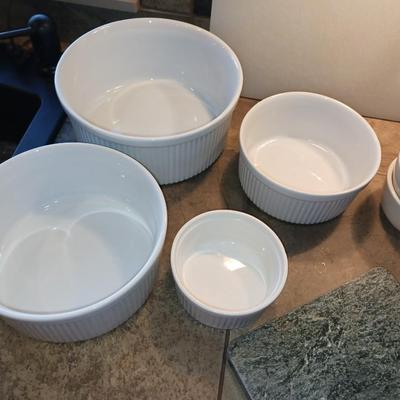 CRUETS, BAKING DISHES, SERVING BOWLS AND CUTTING BOARD