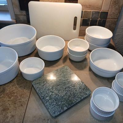 CRUETS, BAKING DISHES, SERVING BOWLS AND CUTTING BOARD