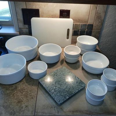 CRUETS, BAKING DISHES, SERVING BOWLS AND CUTTING BOARD
