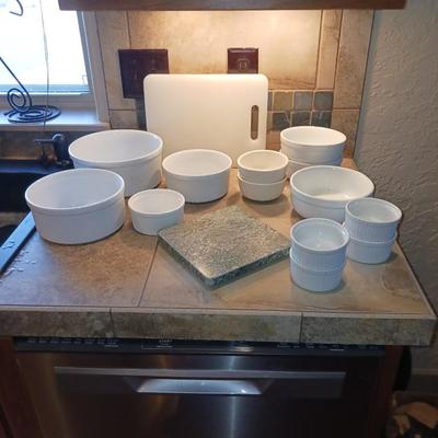 CRUETS, BAKING DISHES, SERVING BOWLS AND CUTTING BOARD
