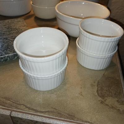 CRUETS, BAKING DISHES, SERVING BOWLS AND CUTTING BOARD