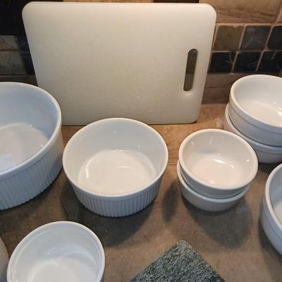 CRUETS, BAKING DISHES, SERVING BOWLS AND CUTTING BOARD