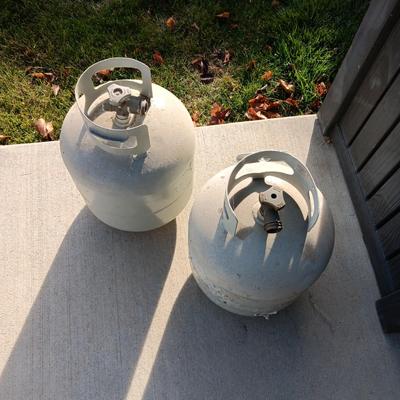 2 PARTIALLY FULL PROPANE TANKS