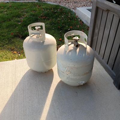 2 PARTIALLY FULL PROPANE TANKS