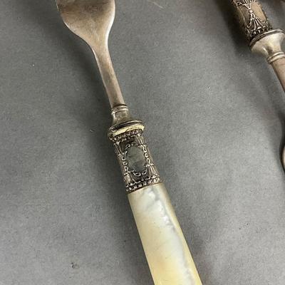 K970 Set of Antique Pearl Handled Forks and Dinner Knives, with Trivet