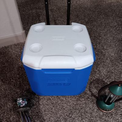 2 WINDCHIMES AND A COLEMAN COOLER ON WHEELS