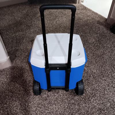 2 WINDCHIMES AND A COLEMAN COOLER ON WHEELS