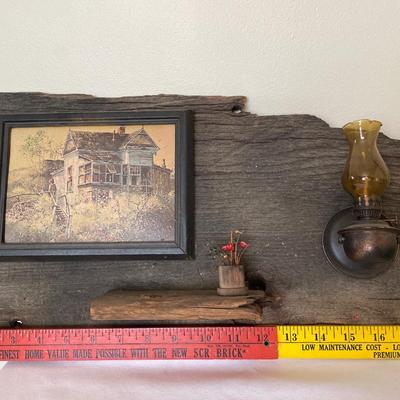 Unique barnwood decor with small oil lamp