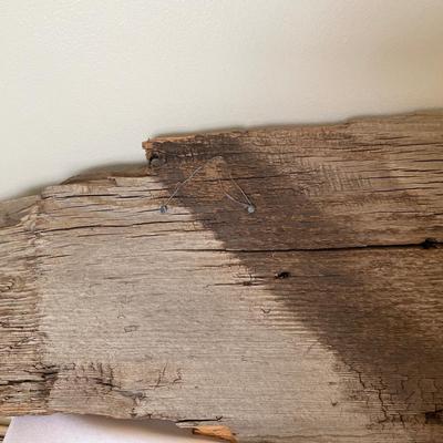 Unique barnwood decor with small oil lamp