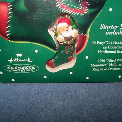 LOT 31 HALLMARK ORNAMENTS & HOOKED ON COLLECTING in BOXES