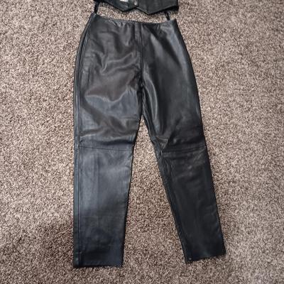 LADIES LEATHER VEST W/STURGIS PEWTER PINS AND HARLEY DAVIDSON PATCH PLUS LEATHER PANTS