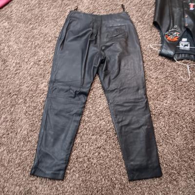 LADIES LEATHER VEST W/STURGIS PEWTER PINS AND HARLEY DAVIDSON PATCH PLUS LEATHER PANTS