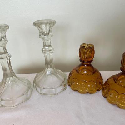 2 sets of glass candlestick holders
