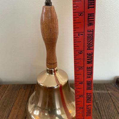 Large bell with wood handle
