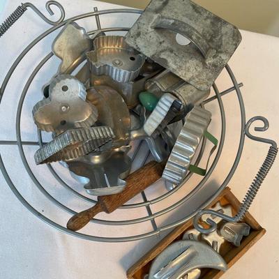 Vintage basket of cookie cutters