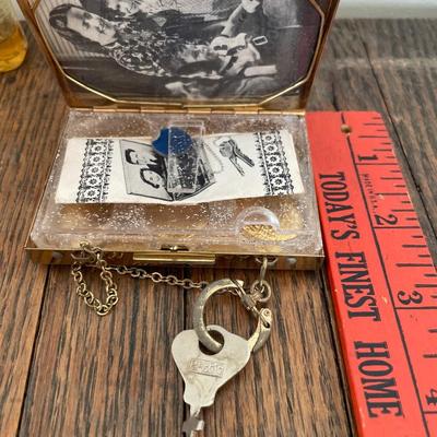 Small vintage Old Spice bottle & coin holder with lock