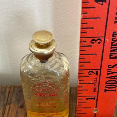 Small vintage Old Spice bottle & coin holder with lock