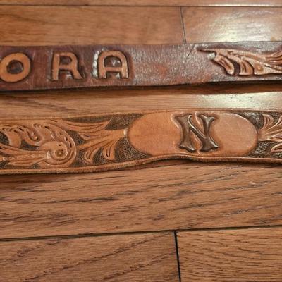 Mixed Lot of Tooled Leather Belts and a Wyoming Belt Buckle
