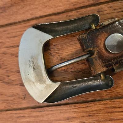 Mixed Lot of Tooled Leather Belts and a Wyoming Belt Buckle