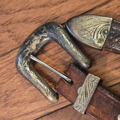 Mixed Lot of Tooled Leather Belts and a Wyoming Belt Buckle