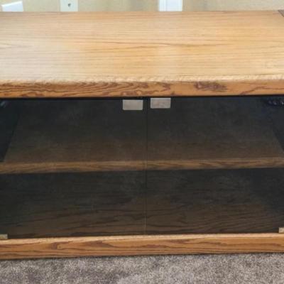 Television Stand with Pull Out Shelf and Glass Doors