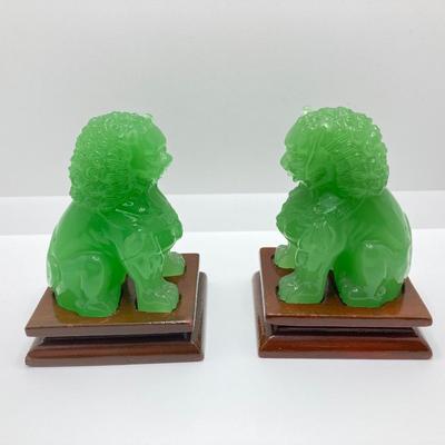 LOT 55: Vintage Carved Green Jade Foo Dogs with Wood Stands