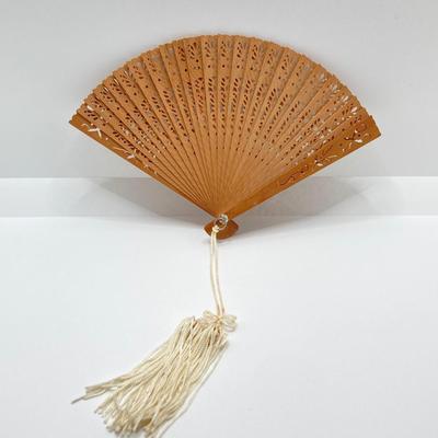 LOT 58: Vintage Asian Carved Collection - Cinnabar snuff bottle, Jade Elephant, Hand Held Filigree Wood Fan and More