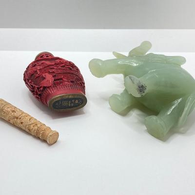 LOT 58: Vintage Asian Carved Collection - Cinnabar snuff bottle, Jade Elephant, Hand Held Filigree Wood Fan and More