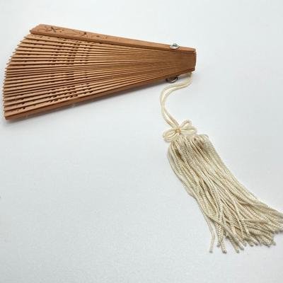 LOT 58: Vintage Asian Carved Collection - Cinnabar snuff bottle, Jade Elephant, Hand Held Filigree Wood Fan and More