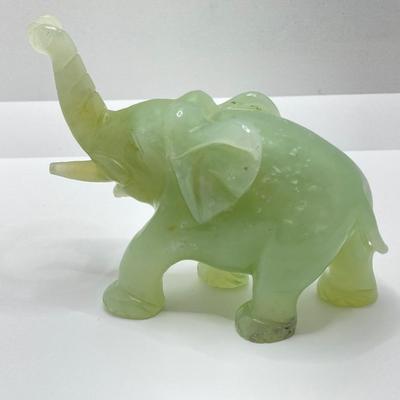 LOT 58: Vintage Asian Carved Collection - Cinnabar snuff bottle, Jade Elephant, Hand Held Filigree Wood Fan and More