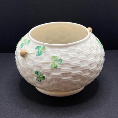 LOT 62: Belleek Bud Vase with Original Box, Miniature Basket, Cream and Sugar Bowls and Northern Ireland Assembly Paperweight