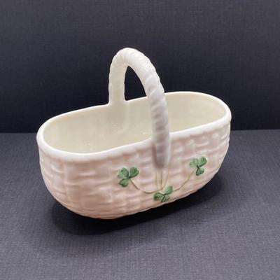 LOT 62: Belleek Bud Vase with Original Box, Miniature Basket, Cream and Sugar Bowls and Northern Ireland Assembly Paperweight