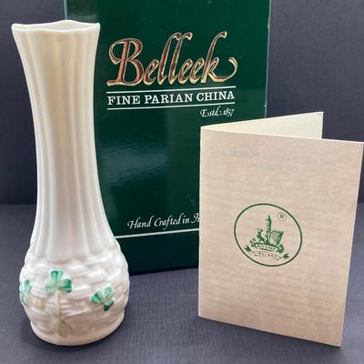 LOT 62: Belleek Bud Vase with Original Box, Miniature Basket, Cream and Sugar Bowls and Northern Ireland Assembly Paperweight