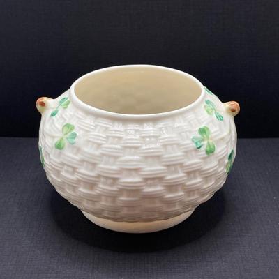 LOT 62: Belleek Bud Vase with Original Box, Miniature Basket, Cream and Sugar Bowls and Northern Ireland Assembly Paperweight